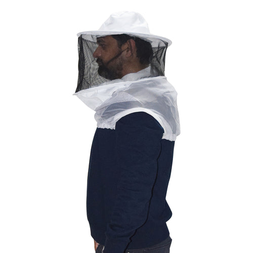Person wearing a beekeeping suit with a hood on a white background