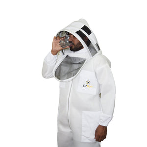 Person wearing a white beekeeping suit with a hood on a white background