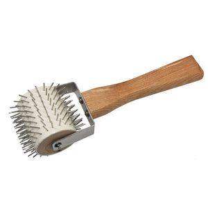 Hairbrush with wooden handle and metal bristle head on a white background
