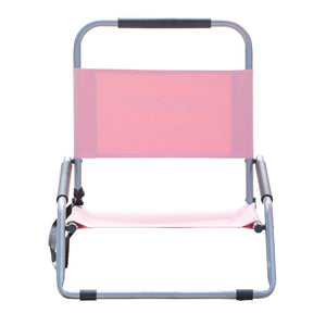 Pink folding chair with metal frame on a white background