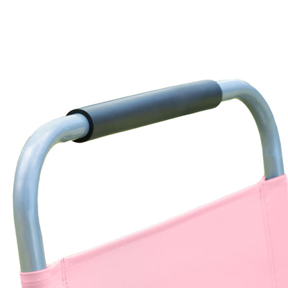 Close-up of a pink chair with a metal handle on a white background