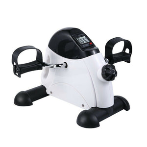 White and black exercise bike with digital display on a white background
