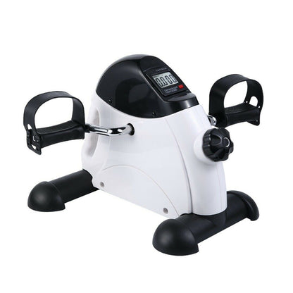 White and black exercise bike with digital display on a white background