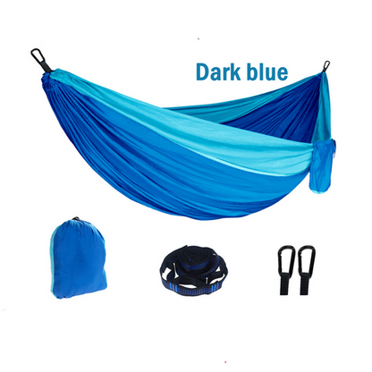 A dark blue outdoor camping hammock with its carrying storage bag, displayed with its size of 260x140cm highlighted.