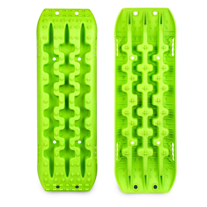 Two green ice cube trays with unique patterns on a white background