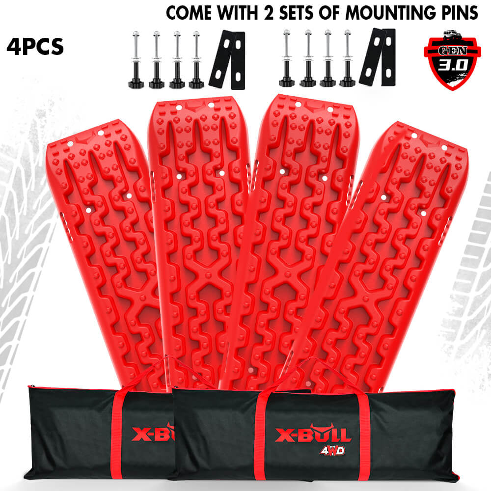 A set of two red X-BULL recovery tracks with mounting bolts and pins, displayed with a black carrying tote.