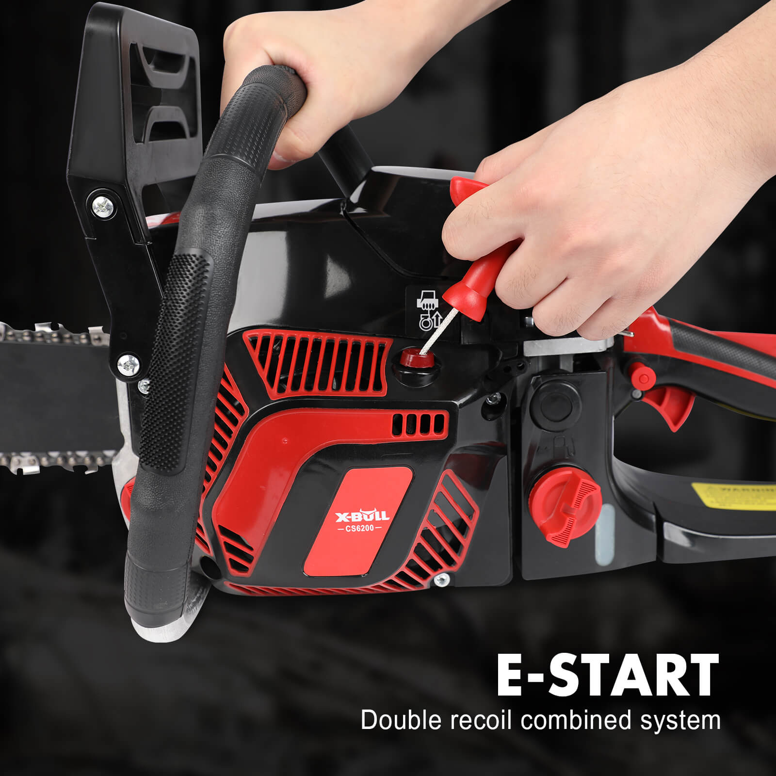 Person holding a chainsaw with E-Start system on a black background
