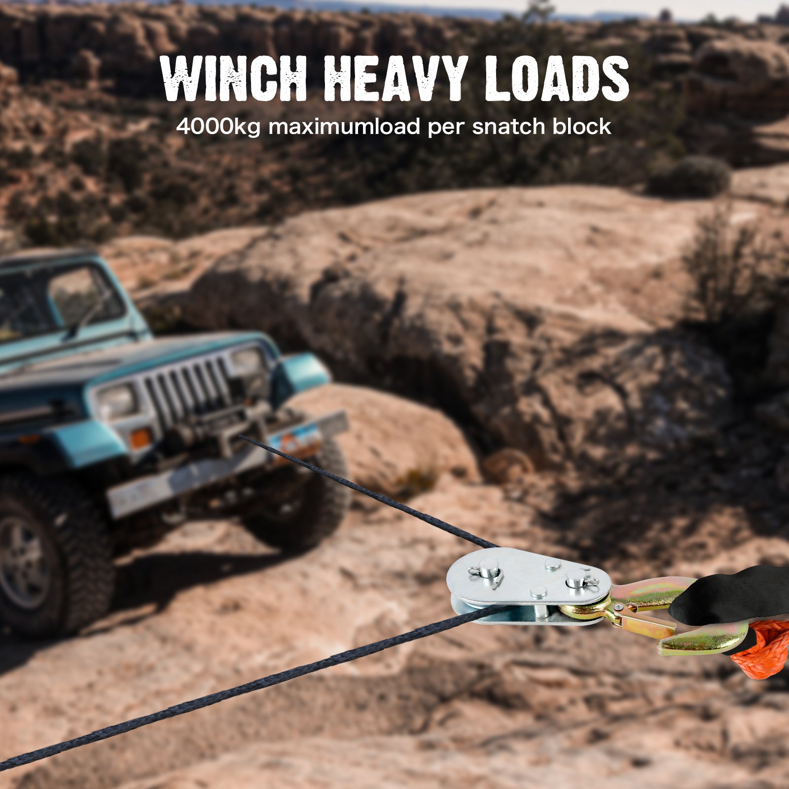 Winch system with a vehicle in a rocky desert landscape, emphasizing heavy load capacity.