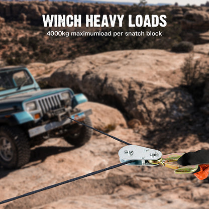 Winch system with a vehicle in a rocky desert landscape, emphasizing heavy load capacity.