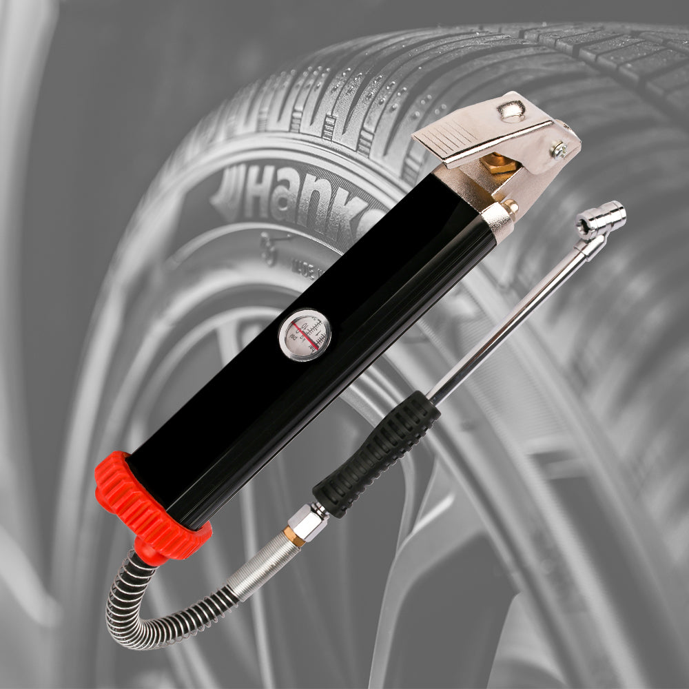Car tire inflator with a blurred tire background