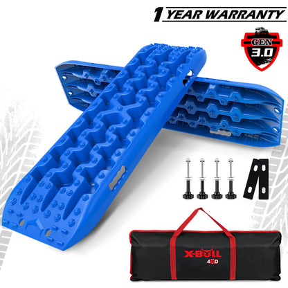 A set of blue recovery tracks labeled X-BULL with various components including mounting pins, leashes, and a carry bag.