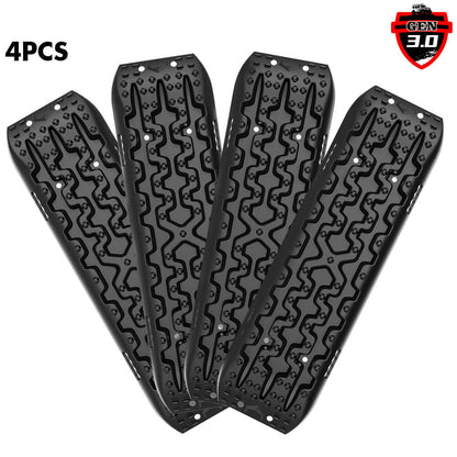 Four black nylon recovery tracks with a herringbone pattern, designed for off-road vehicle use.