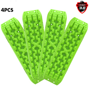 A set of four green nylon recovery tracks laid out flat with the X-BULL brand logo visible.