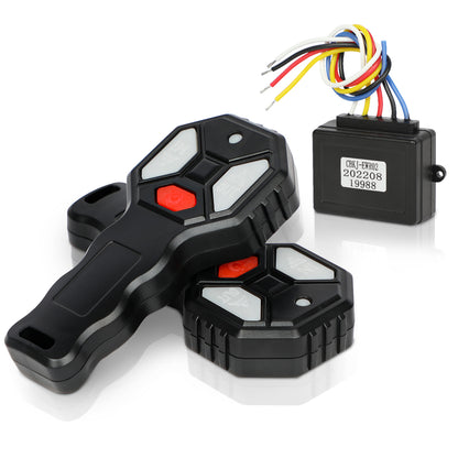 Black electronic device with red buttons and wiring on a white background