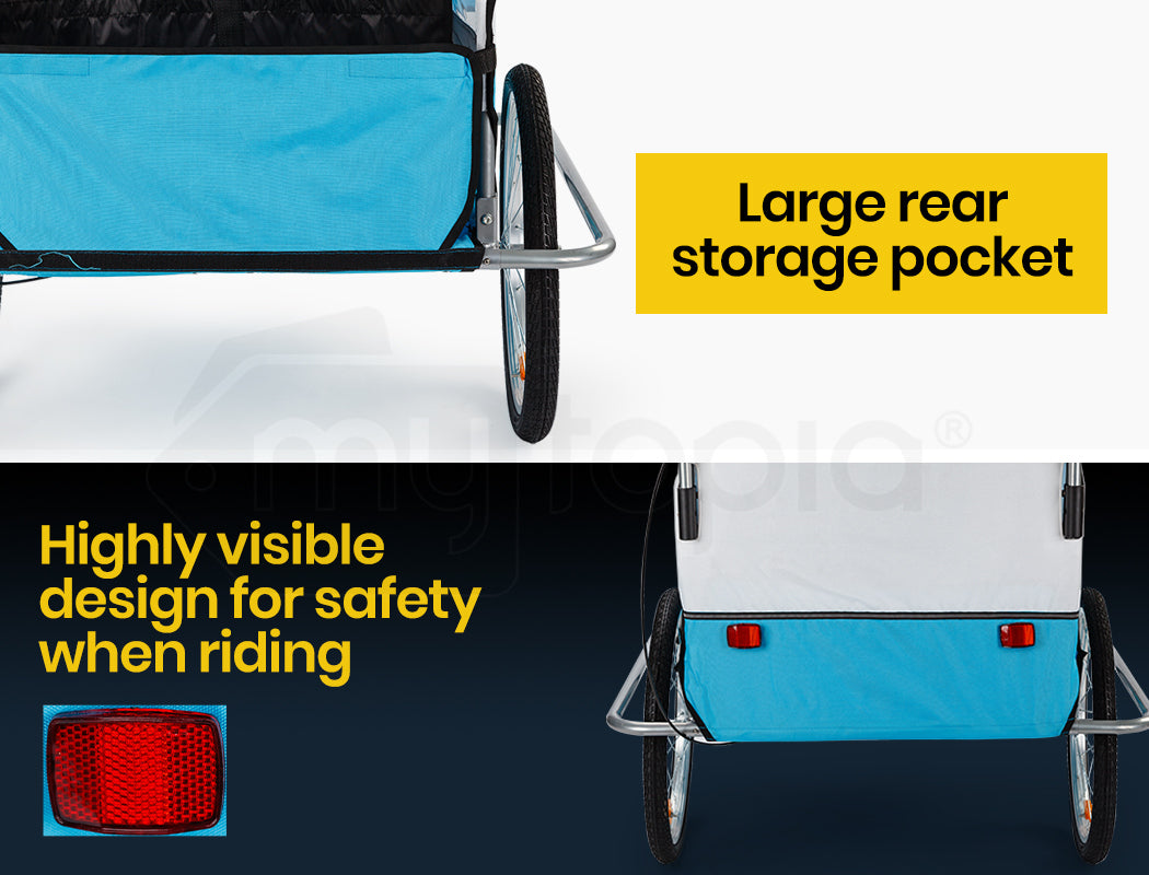 Blue and black bike trailer with large rear storage pocket and visible design features on a white and dark background.
