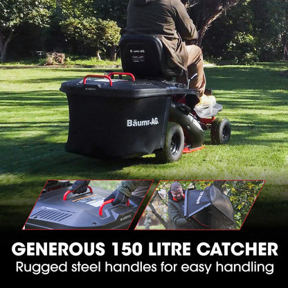 Person using a lawn mower with a large black catcher attached, on a grassy field.