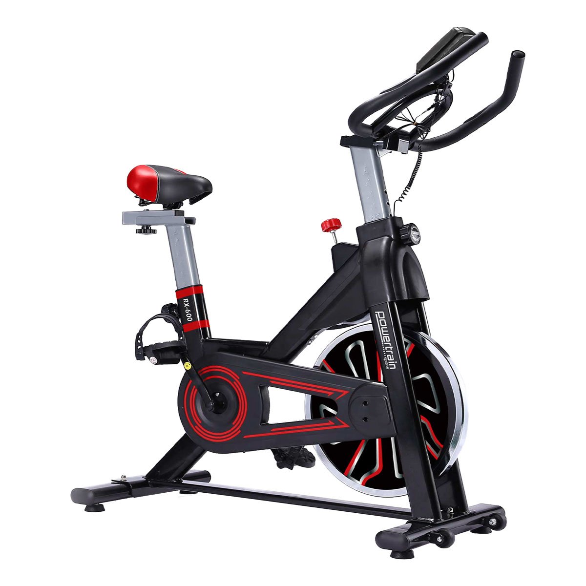 A red and black Powertrain RX-600 exercise spin bike with adjustable seat and handlebars, featuring an LCD display and a large flywheel.