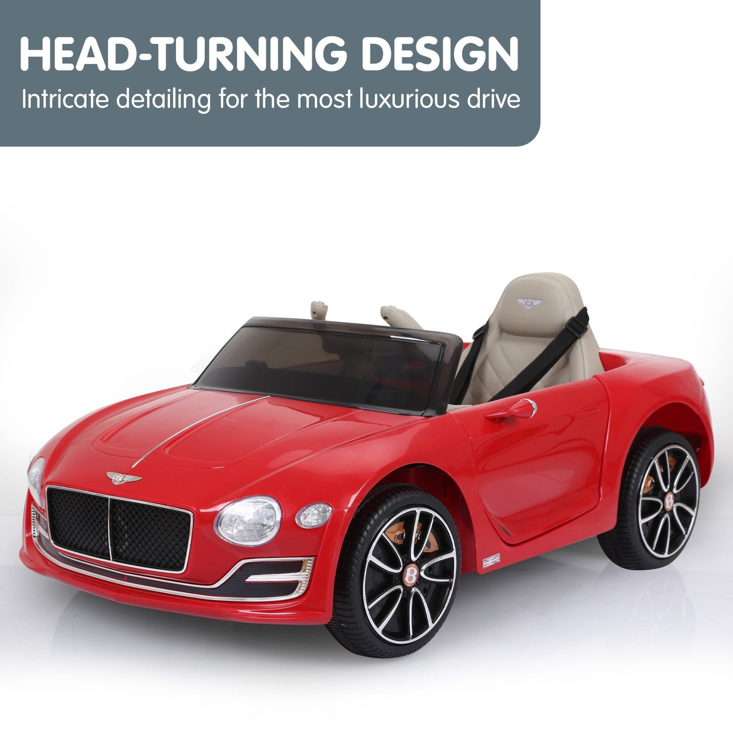 Red toy car with beige interior on a white background, labeled 'HEAD-TURNING DESIGN'.