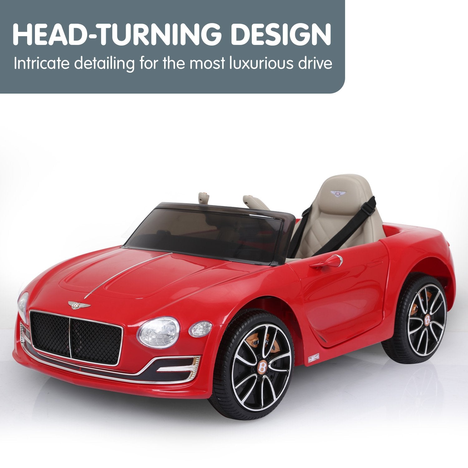 Red toy car with beige interior on a white background, labeled 'HEAD-TURNING DESIGN'.