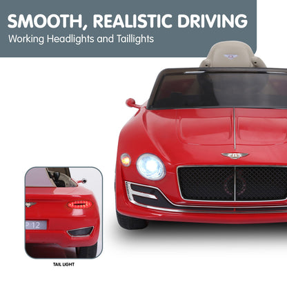 Red toy car with working headlights and tail lights on a gray background