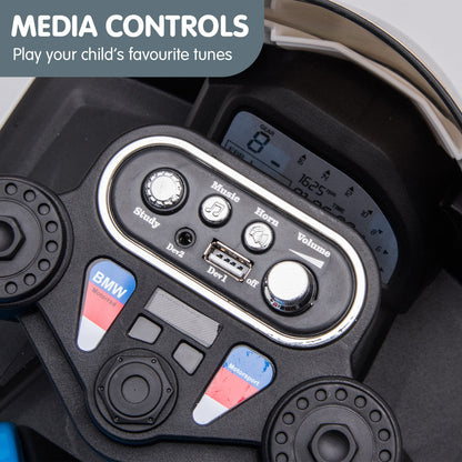 Media control panel with BMW logo on a vehicle dashboard