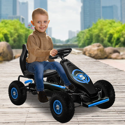 Child sitting on a black and blue go-kart with a cityscape background