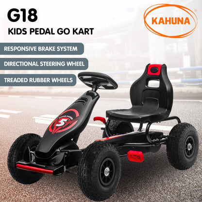 Kids pedal go kart with features listed on a blurred road background