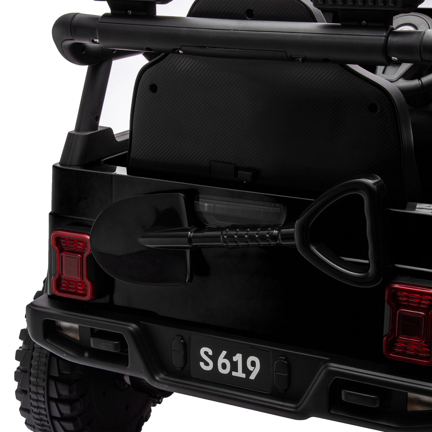 Black off-road vehicle with a spare tire mounted on the back