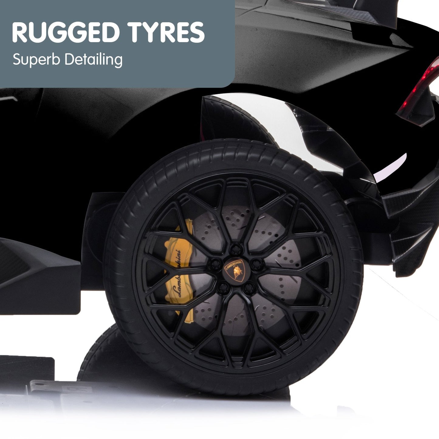 Close-up of a black car wheel with detailed tread pattern on a white background, featuring the text 'Rugged Tyres' and 'Superb Detailing'.