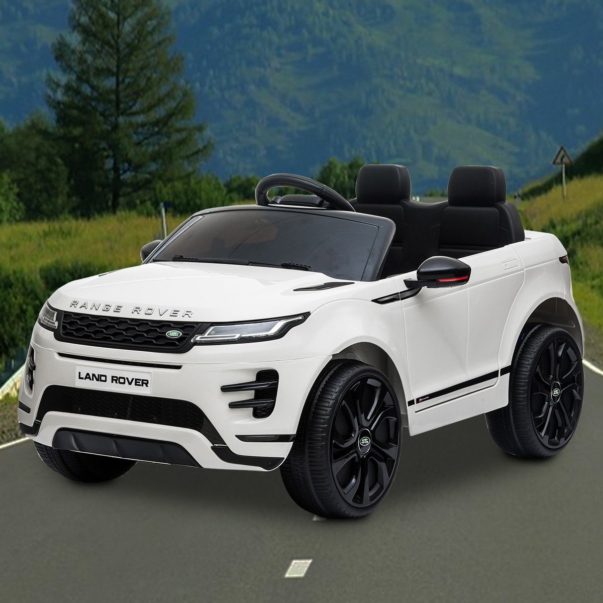 White toy Range Rover on a road with a scenic background