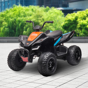 Children's ATV with orange and black design on a tiled pavement