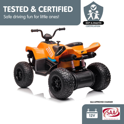 Orange toy ATV with certification logos on a white background