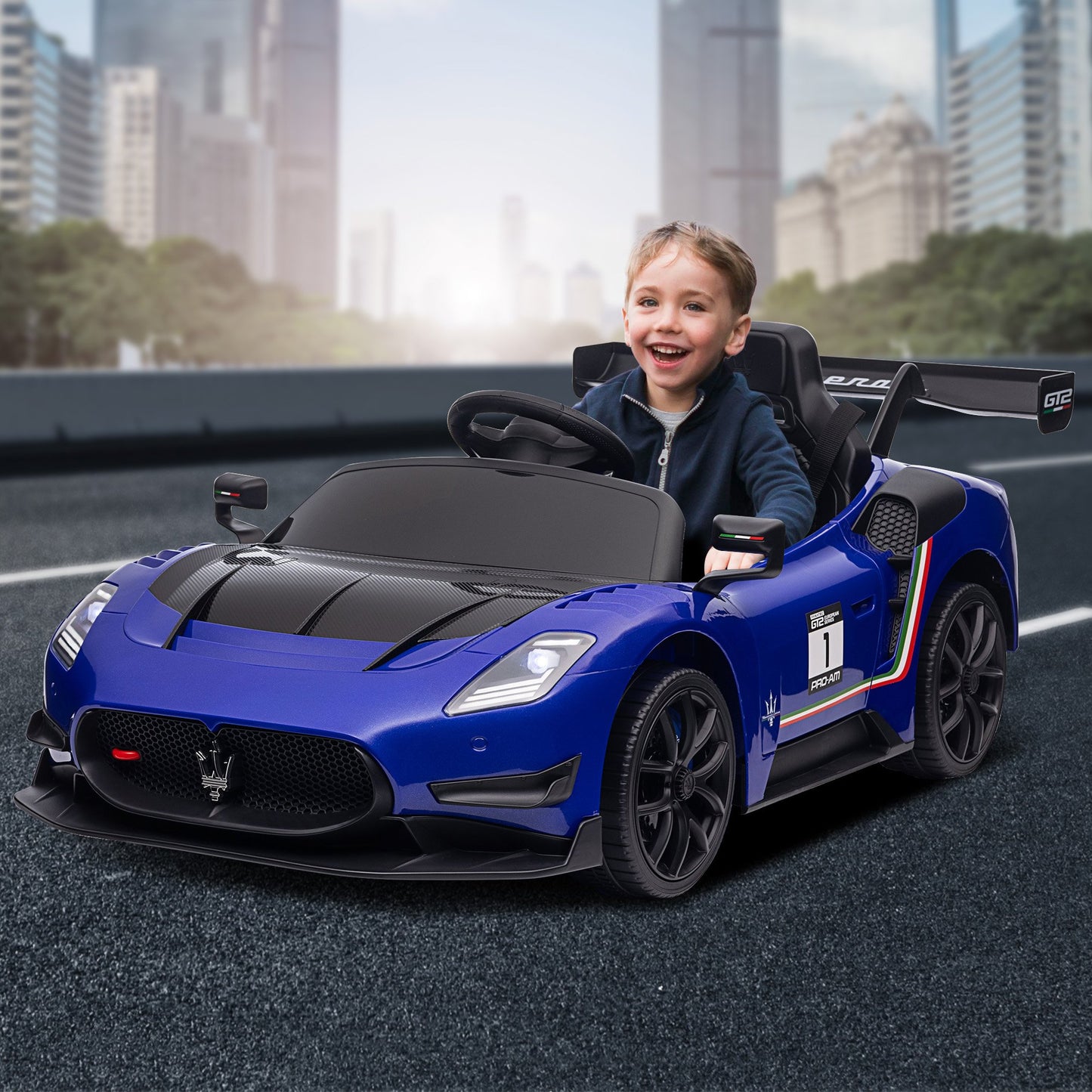 Child sitting in a blue toy sports car with a cityscape background