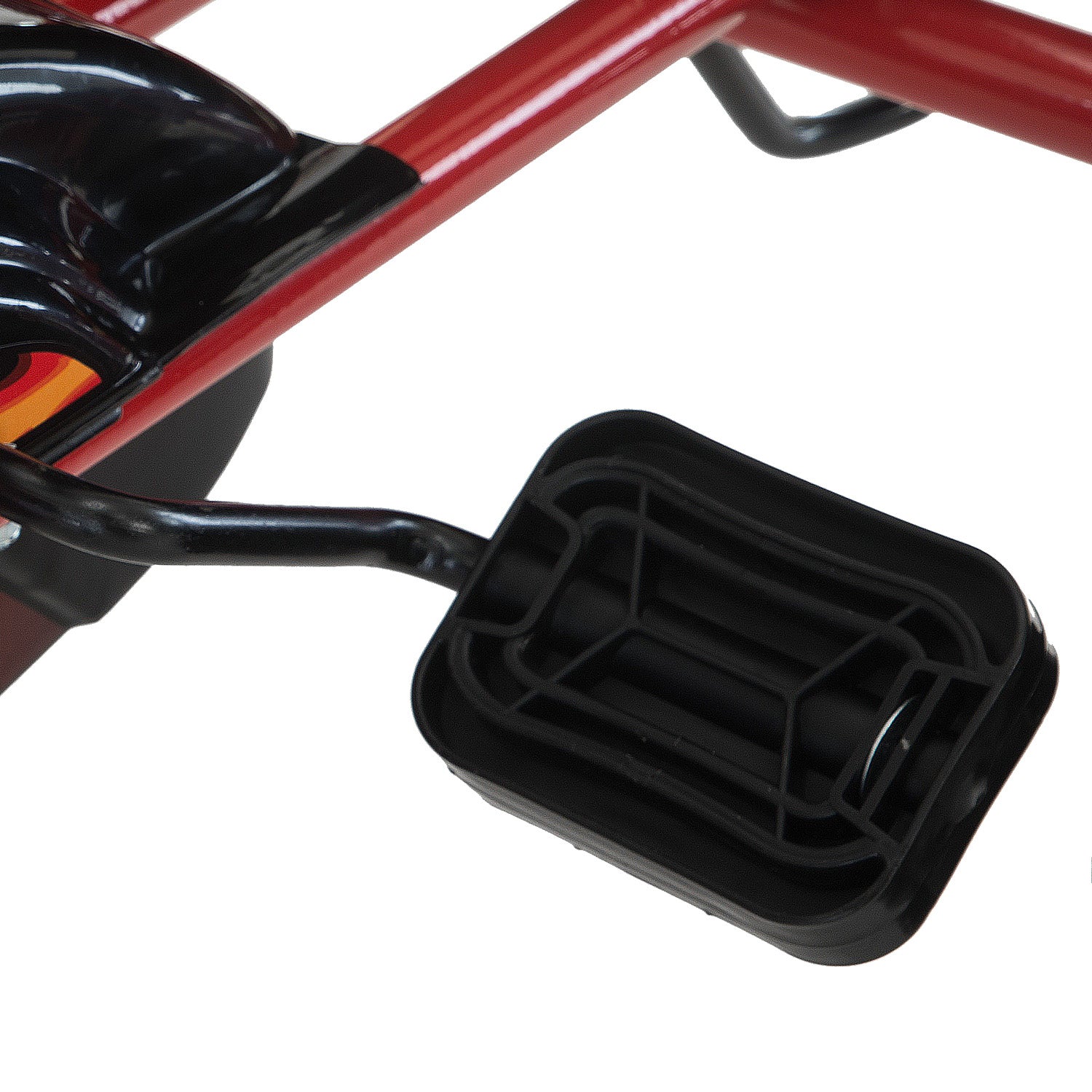 Black foot peg on a red motorcycle with a white background