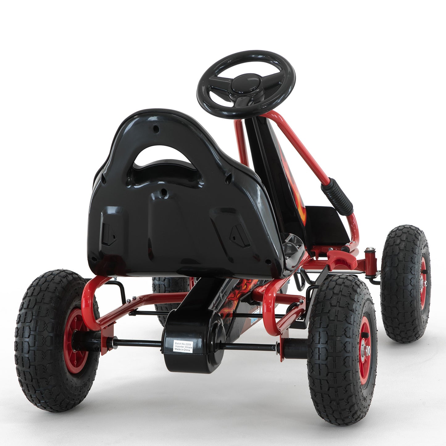 Black and red pedal go-kart on a white background