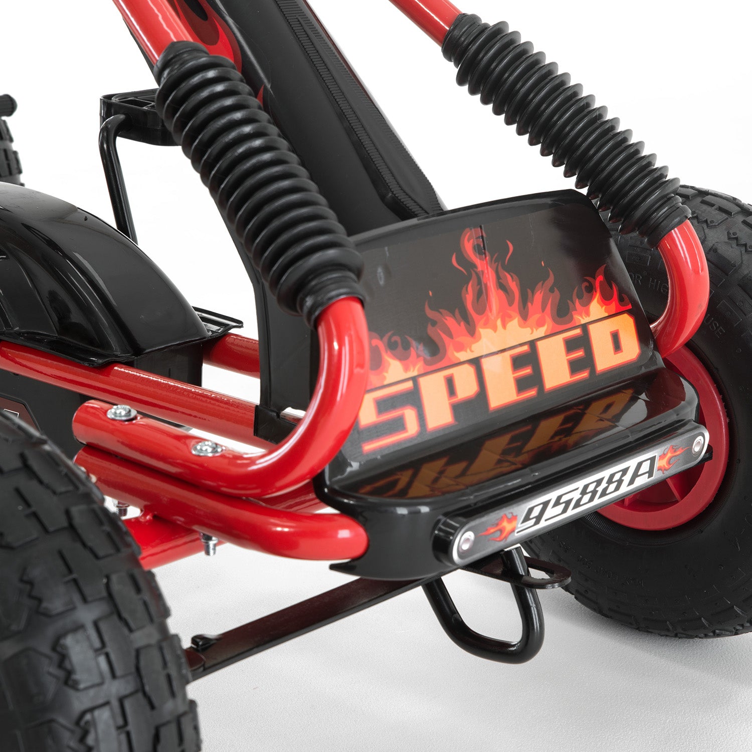 Close-up of a red and black off-road vehicle with 'SPEED' branding on a white background