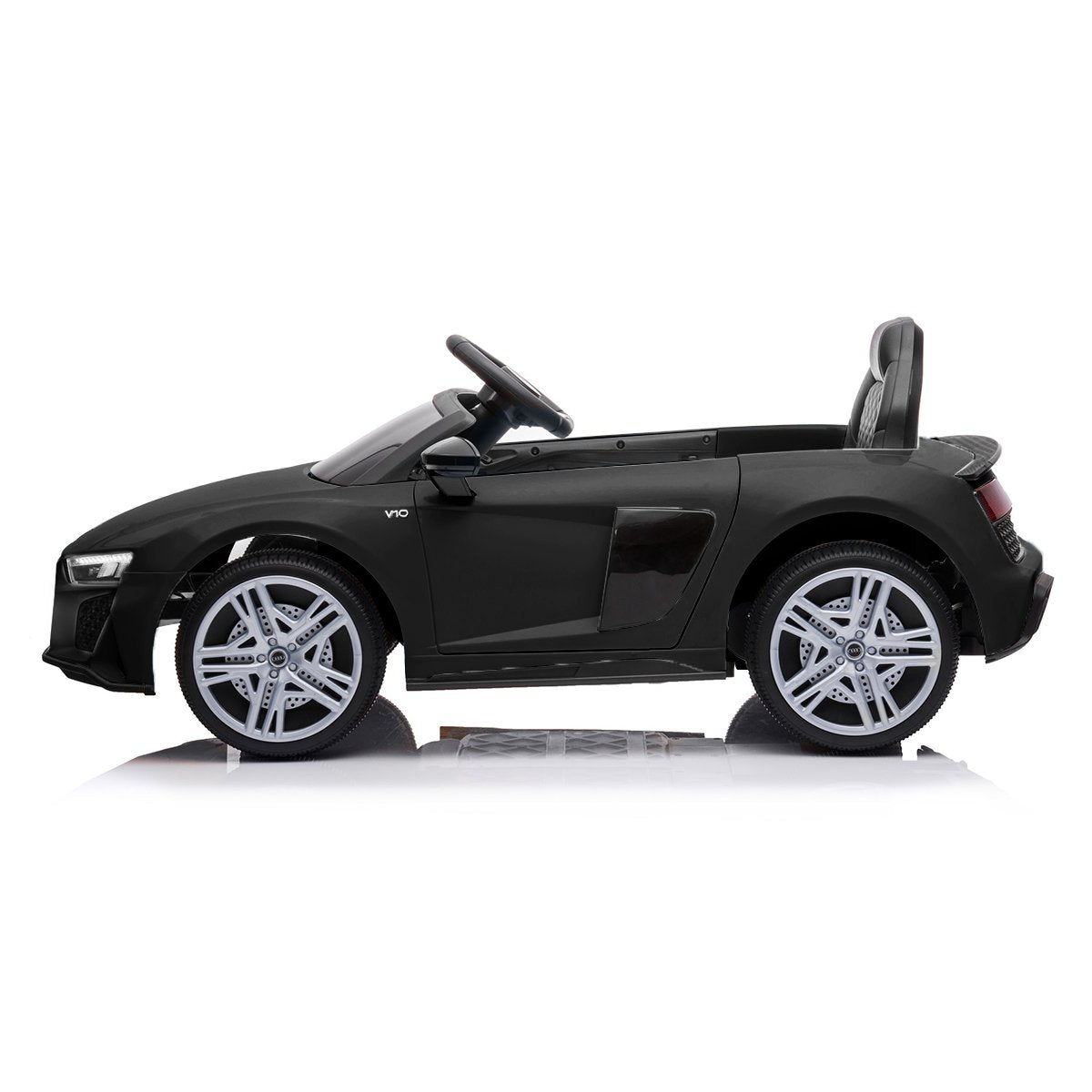 Black toy car with silver rims on a white background