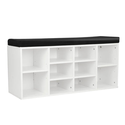 White shoe cabinet with multiple compartments and a cushioned bench on top.