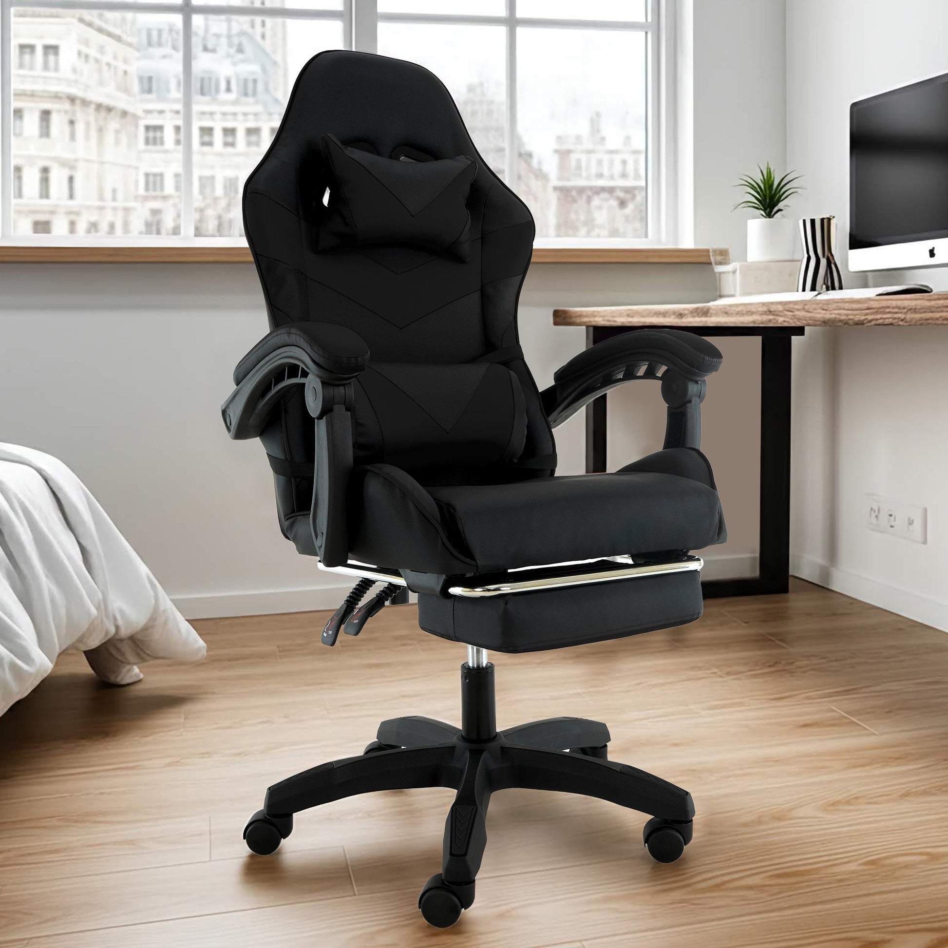 Black office chair in a room with a desk and window