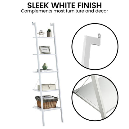 White ladder shelf with decorative items on a white background, highlighting its sleek finish.