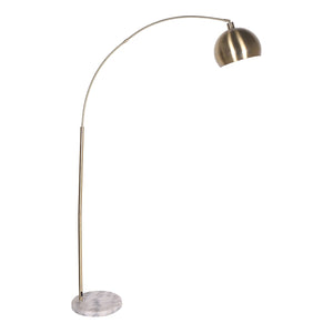 An arc floor lamp with a antique brass finish and a marble base, with the lamp arc extending upwards from a round base.