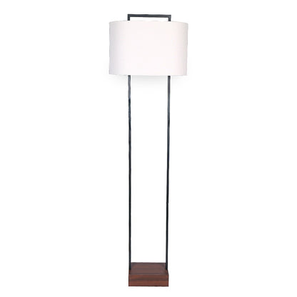 A Sarantino wood floor lamp with a cherry finish base and a white oval shade.