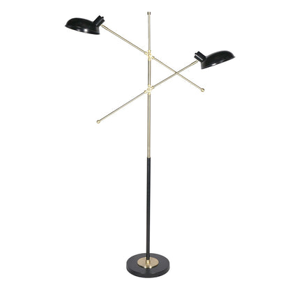 An adjustable two-light floor lamp with a black and gold finish and double adjustable arms.