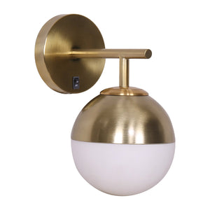 A wall lamp with a gold metal base and a white frosted glass globe shade.