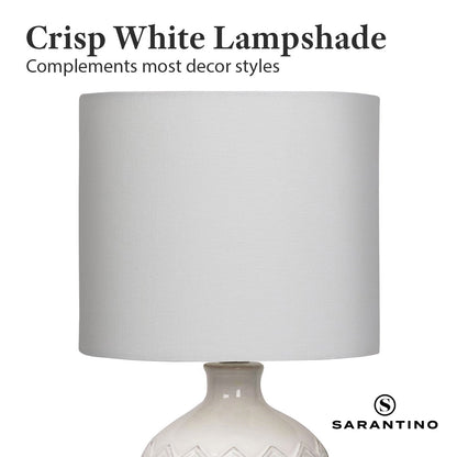 White lampshade on a white background with Sarantino branding