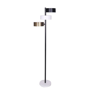 A Sarantino metal floor lamp with three cylinder shades in black, white, and gold finishes.