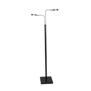A floor lamp with a black metal base and two-tone design, featuring brushed gold arms and two adjustable LED light fixtures.
