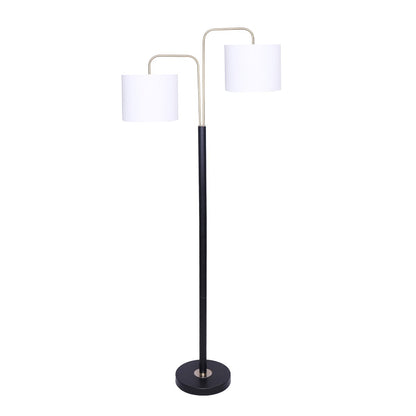 A floor lamp with a black base and brass finish accents, featuring two white linen shades.