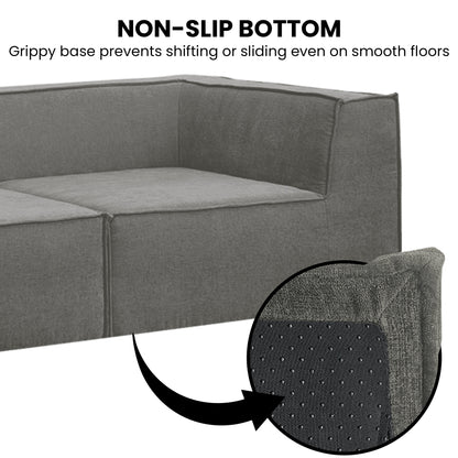 Gray sofa with a close-up of the non-slip bottom and text indicating it prevents shifting or sliding.
