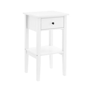 A white Sarantino Rue Bedside Table with a drawer and open shelf storage, featuring a matte paint finish and high-leg design.